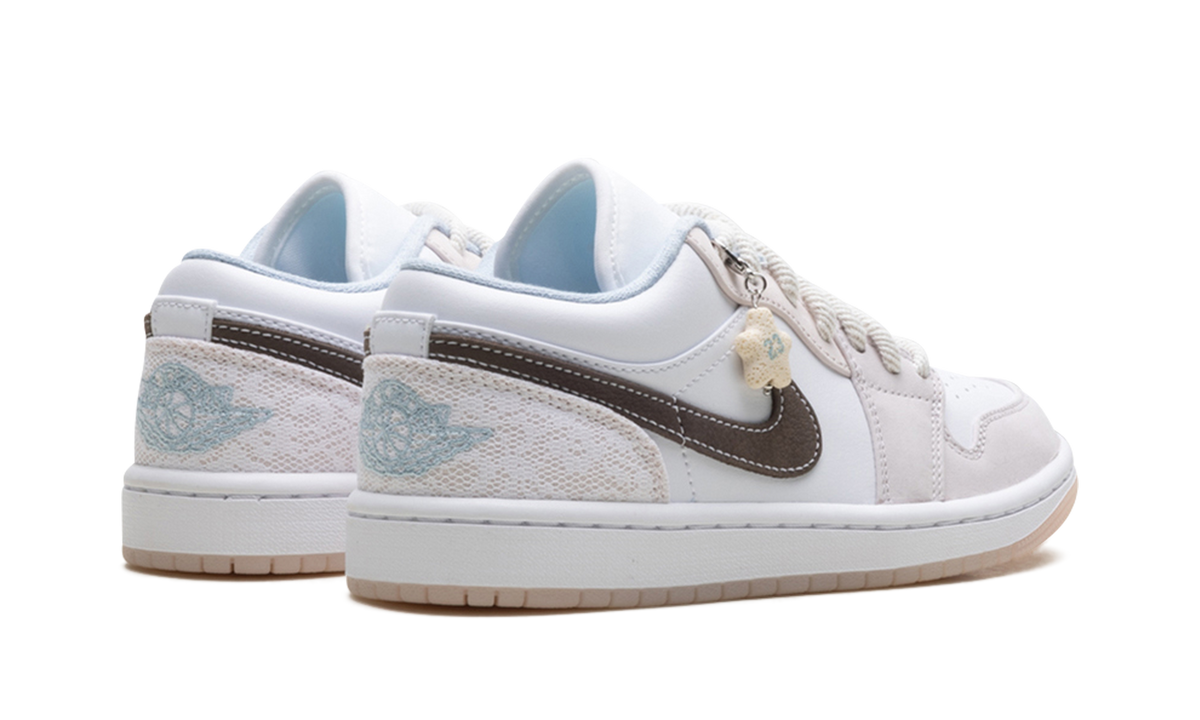 Jordan 1 Low WMNS "Coral" IB8859 101