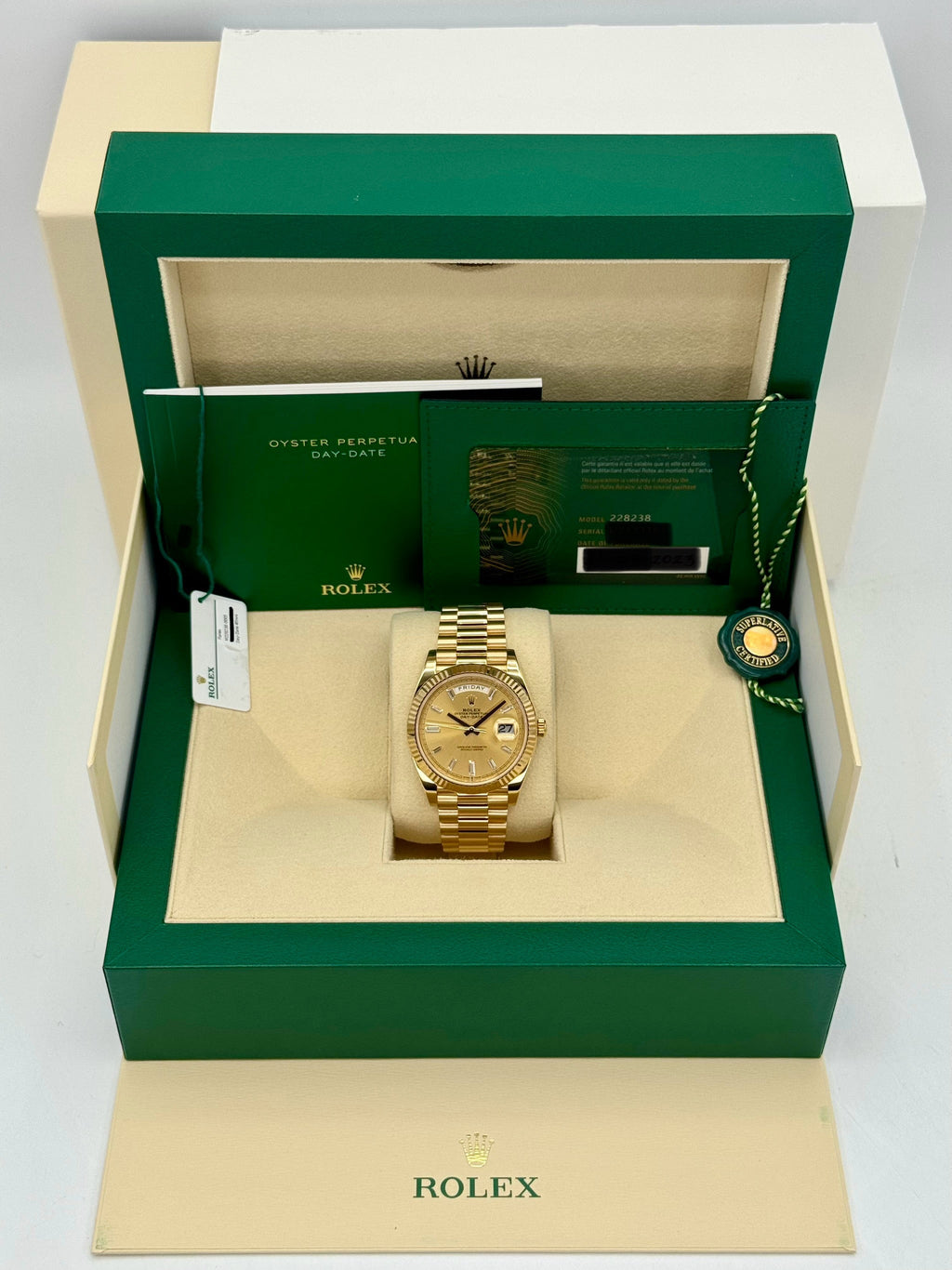 2023 Rolex Day-Date 40mm 228238 Champagne Diamond Baguette Dial