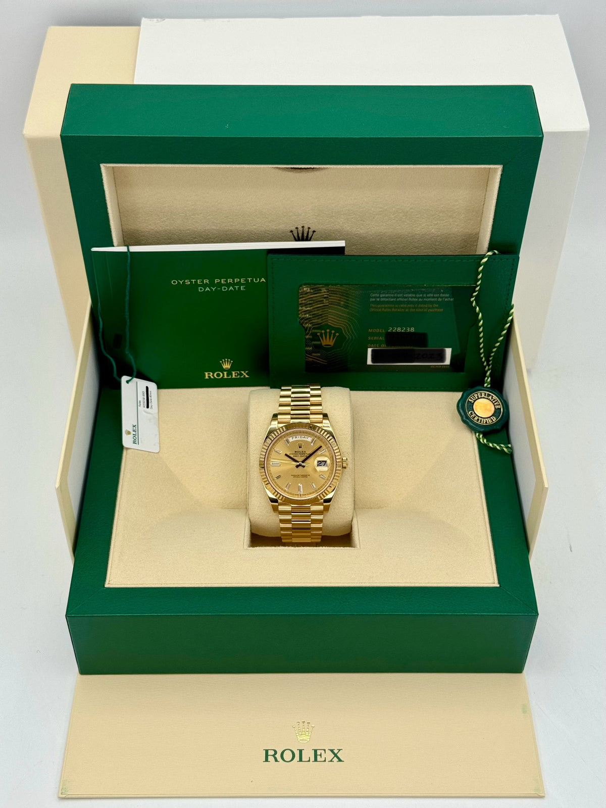 2023 Rolex Day-Date 40mm 228238 Champagne Diamond Baguette Dial