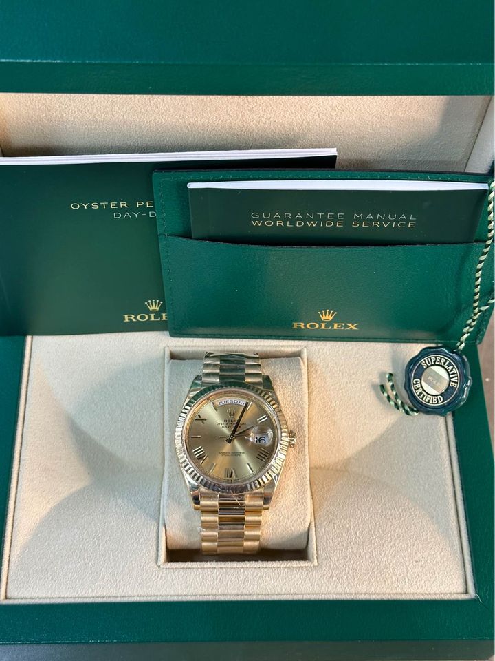 Rolex Day-Date 40mm 228238 Presidential Champagne Dial